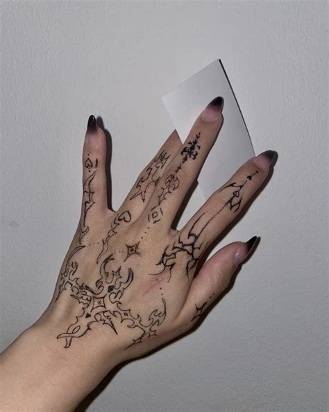 Y2k hand tattoos - At Idle Hands Tattoo, we provide our clients with professional custom tattoo services by appointment only. You will find our environment to be safe and hospital sterile and the customer service to exceed your expectations. For more information call 865.830.3322.